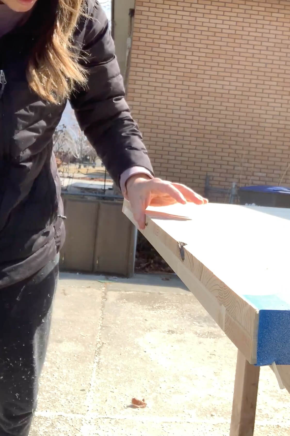 Smooth edge of a table after finishing using the planer. 